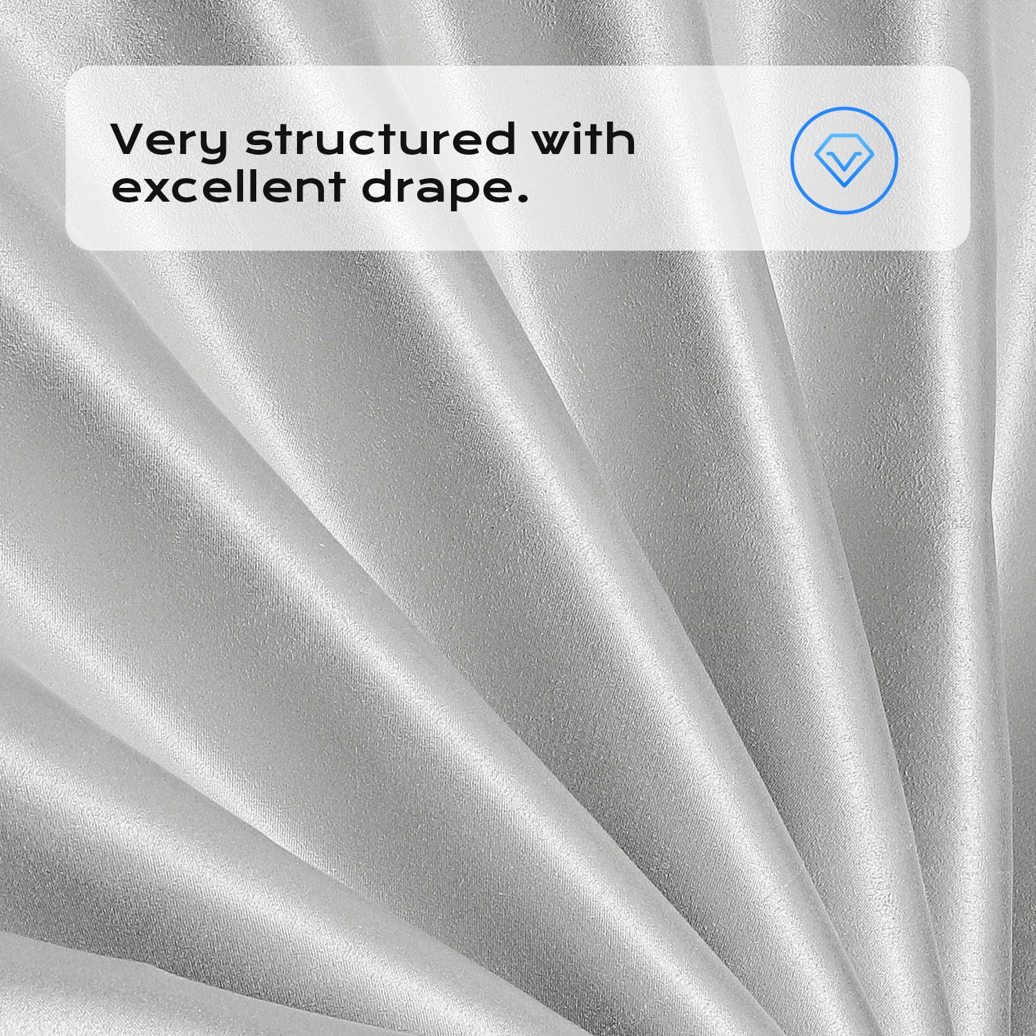 Close-up of high-quality silver fabric showing its structured texture and excellent draping ability.